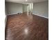 Spacious living room features hardwood floors and natural light at 1881 Harvest Meadow Dr, Greenwood, IN 46143