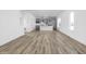 Open concept kitchen with island, grey cabinetry, and stainless steel appliances at 2149 N College Ave, Indianapolis, IN 46202