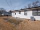 The back patio features an easy-to-maintain yard at 2219 W 59Th St, Indianapolis, IN 46228