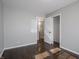 Bedroom with hardwood flooring, neutral walls and closet at 2219 W 59Th St, Indianapolis, IN 46228