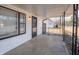 Covered front porch with decorative railing, offering a welcoming outdoor space at 2219 W 59Th St, Indianapolis, IN 46228