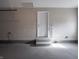 This spacious garage offers painted floors, a utility door, electrical outlets, and additional storage at 2219 W 59Th St, Indianapolis, IN 46228