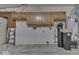 Basement with unfinished features and exposed utilities, offering potential for customization at 223 Andrews Boulevard East Dr, Plainfield, IN 46168