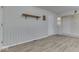Inviting entryway featuring wood-look flooring, neutral walls, and classic molding for a warm, welcoming ambiance at 223 Andrews Boulevard East Dr, Plainfield, IN 46168