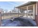 Covered patio with screened walls offering an open view of the fenced in backyard of the property at 223 Andrews Boulevard East Dr, Plainfield, IN 46168