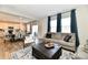 Open-concept living room with seamless access to the kitchen and dining area, enhancing the sense of space and flow at 28 Lively Pl, Cicero, IN 46034