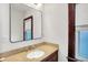 Bathroom featuring granite countertops and a stylish mirror at 342 N Arsenal Ave, Indianapolis, IN 46201