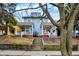 Charming home featuring a classic facade with a welcoming front porch and traditional architectural details at 342 N Arsenal Ave, Indianapolis, IN 46201