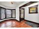Bright room with hardwood floors, large windows, and classic trim, creating a welcoming space at 342 N Arsenal Ave, Indianapolis, IN 46201