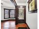 Inviting room featuring hardwood floors, large windows, and classic trim, perfect for comfortable living at 342 N Arsenal Ave, Indianapolis, IN 46201