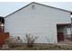 Photo of the side of home showing the exterior with wood fence at 4050 Harmony Dr, Indianapolis, IN 46221
