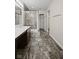 Bathroom with large shower, tile flooring, and sleek vanity at 4236 Stubbington Ln, Indianapolis, IN 46239