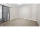 Neutral-toned bedroom with wall to wall carpet and a window at 4236 Stubbington Ln, Indianapolis, IN 46239