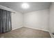 Bare bedroom with neutral paint, carpet and a window at 4236 Stubbington Ln, Indianapolis, IN 46239
