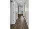 Hallway with sleek flooring leading to the front door and bedrooms at 4236 Stubbington Ln, Indianapolis, IN 46239