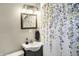 Bathroom featuring a vanity with a sink and a decorative shower curtain at 529 W 42Nd St, Indianapolis, IN 46208