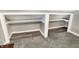Spacious closet with a modern shelf design and carpeted floors at 529 W 42Nd St, Indianapolis, IN 46208