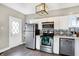 Well-equipped kitchen featuring stainless steel appliances and ample cabinet space at 529 W 42Nd St, Indianapolis, IN 46208