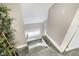 Carpeted stairs leading to the upper level of the house with white railings at 529 W 42Nd St, Indianapolis, IN 46208