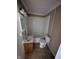 Small bathroom with a tub/shower combo, a vanity sink, and a toilet at 603 W 33Rd St, Anderson, IN 46013