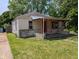Charming single-Gathering home featuring a covered porch, and a well-maintained lawn at 603 W 33Rd St, Anderson, IN 46013