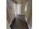 Hallway that accesses a bedroom and contains a storage closet at 603 W 33Rd St, Anderson, IN 46013