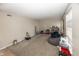 Spacious living room with carpet, lots of natural light, and neutral paint at 6116 Bartley Ct, Indianapolis, IN 46236