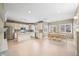 Bright kitchen with stainless steel appliances, a kitchen island, and open layout dining area at 685 Greystone Ct, Columbus, IN 47201