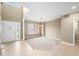 Bright, spacious living room with high ceilings, and large windows at 685 Greystone Ct, Columbus, IN 47201