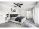 Bedroom with natural lighting, ceiling fan, and neutral color scheme at 7082 Muskrat Dr, Nineveh, IN 46164