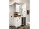 Beverage station featuring a wine cooler, white cabinets, and a sleek countertop at 7082 Muskrat Dr, Nineveh, IN 46164