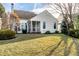 This home's backyard has a well-kept lawn and screened-in porch at 8044 Clymer Ln, Indianapolis, IN 46250