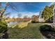 Well-maintained backyard overlooks a tranquil pond at 8044 Clymer Ln, Indianapolis, IN 46250