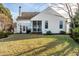 Beautiful white home with a well-kept lawn and screened-in porch at 8044 Clymer Ln, Indianapolis, IN 46250
