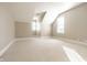Large bonus room with neutral walls, carpeted flooring, and natural light from windows at 8044 Clymer Ln, Indianapolis, IN 46250