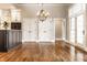 Well-lit kitchen with hardwood floors, a center island, stainless steel appliances, and plenty of storage space at 8044 Clymer Ln, Indianapolis, IN 46250