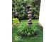 Landscaped statue provides character to the garden at 8044 Clymer Ln, Indianapolis, IN 46250