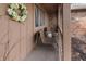 Cozy front porch with seating area, perfect for relaxing and enjoying the outdoors at 8316 Hill Gail Dr, Indianapolis, IN 46217
