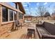 Inviting wooden deck with comfortable seating, ideal for relaxing and entertaining outdoors at 8316 Hill Gail Dr, Indianapolis, IN 46217