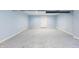 Unfinished basement showcasing painted walls and concrete flooring at 8350 E Cr 200 S, Zionsville, IN 46077