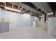 Basement with exposed ceiling, laundry area, and utility equipment at 8350 E Cr 200 S, Zionsville, IN 46077