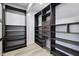 Walk-in closet with dark wood shelving at 8350 E Cr 200 S, Zionsville, IN 46077