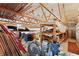 Loft storage with exposed beams, offering substantial space and organization potential at 8350 E Cr 200 S, Zionsville, IN 46077
