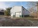 Exterior view of a large two-door storage building with white metal siding and green trim at 8350 E Cr 200 S, Zionsville, IN 46077