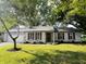 Charming brick home featuring a two-car garage, well-manicured lawn, and tasteful landscaping at 104 Walnut Ct, Noblesville, IN 46062