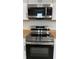 New stainless steel Samsung appliances, including stove, oven, range, and microwave at 104 Walnut Ct, Noblesville, IN 46062