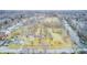 Expansive aerial view of a residential area with mature trees surrounding well-maintained homes at 114 E Mill St, Brooklyn, IN 46111