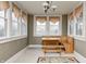 Bright breakfast nook filled with natural light and a built-in wooden bench at 114 E Mill St, Brooklyn, IN 46111