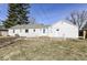 Exterior of a house with a wooden deck and a well-maintained yard at 117 W Mckenzie Rd, Greenfield, IN 46140