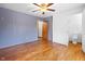 Bedroom features hardwood floors and ensuite bathroom at 122 S Green St, Brownsburg, IN 46112